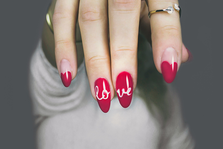 Illustration of healthy painted nails of a lady following nail care tips