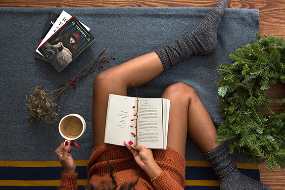 a women reading a book struggling with cancer memory loss and confusion